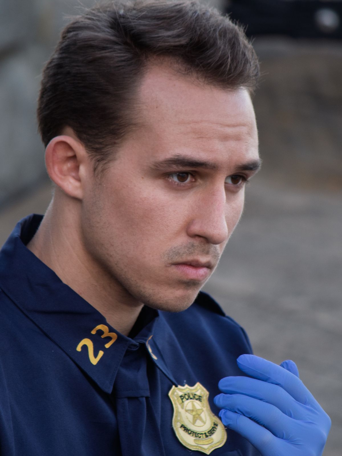 A police officer in a scene from CHOICES